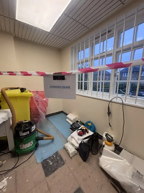 Asbestos floor tile and bitumen removal in Peckham